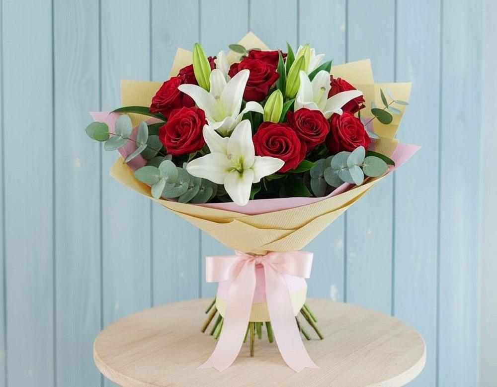 Букет цветов из: Лилии и Розы в Ленинградской